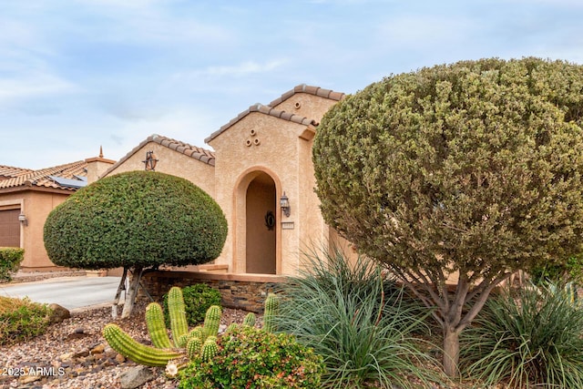 3937 N Smithsonian Dr, Florence, AZ 85132 - mediterranean / spanish-style house with a tiled roof and stucco siding