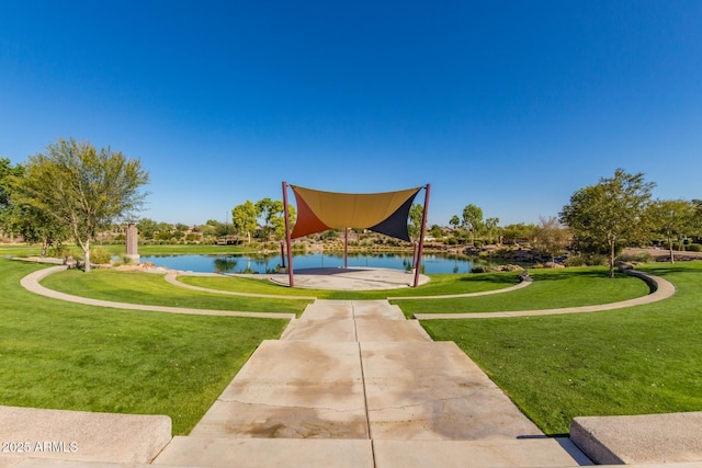 3937 N Smithsonian Dr, Florence, AZ 85132 - view of property's community with a lawn and a water view