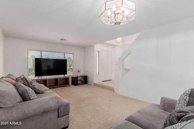 6276 N 75th Ln, Glendale, AZ 85303 - living room with carpet and a chandelier