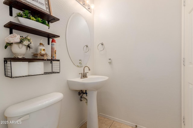 6276 N 75th Ln, Glendale, AZ 85303 - half bath with toilet, baseboards, and tile patterned floors