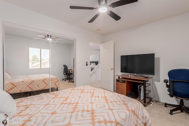 6276 N 75th Ln, Glendale, AZ 85303 - bedroom with carpet, an office area, ceiling fan, a closet, and baseboards