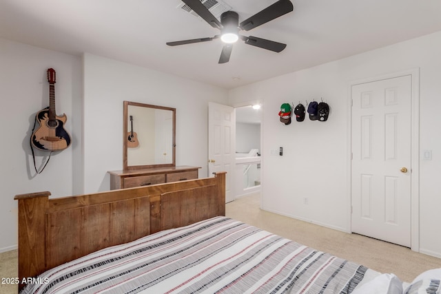 6276 N 75th Ln, Glendale, AZ 85303 - bedroom featuring light colored carpet, baseboards, and ceiling fan