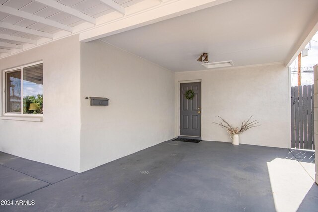 property entrance with a patio area