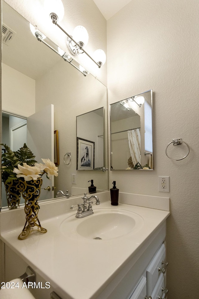 bathroom featuring vanity