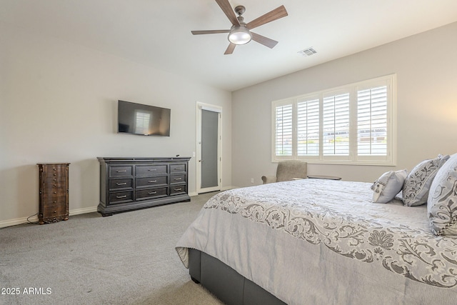 bedroom featuring a ceiling fan, carpet flooring, baseboards, and visible vents