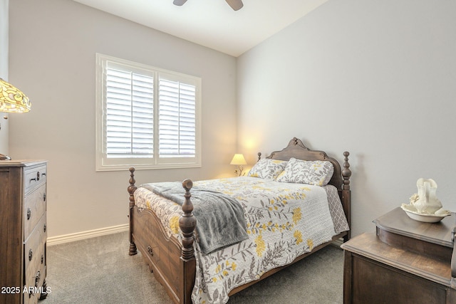 bedroom featuring a ceiling fan, carpet, and baseboards