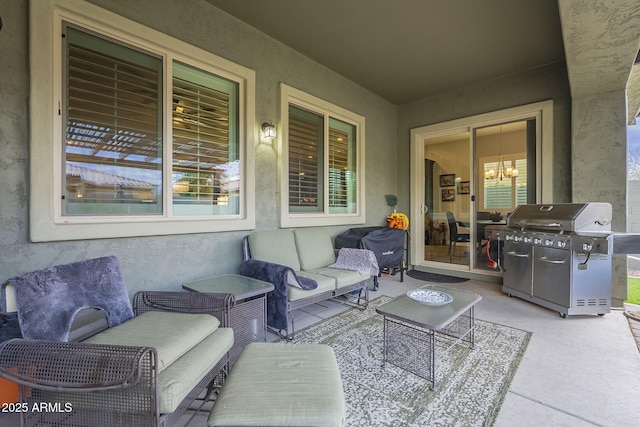 view of patio with an outdoor living space and grilling area