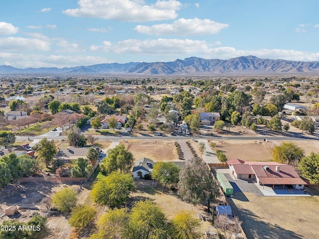 birds eye view of property featuring a mountain view