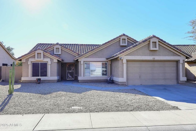 view of front of property with a garage