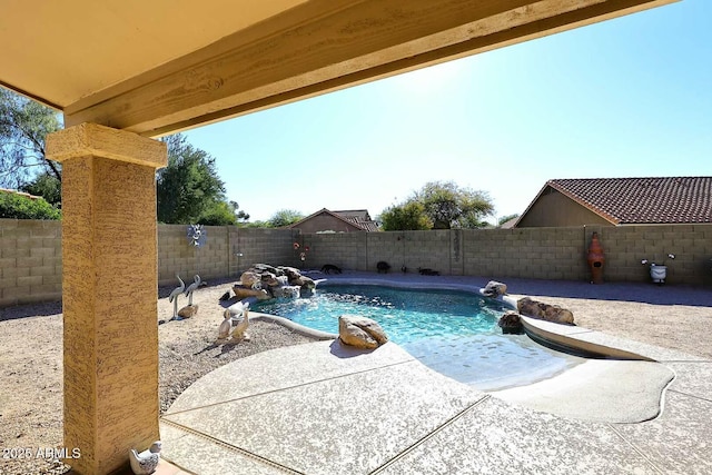 view of pool featuring a patio area and pool water feature