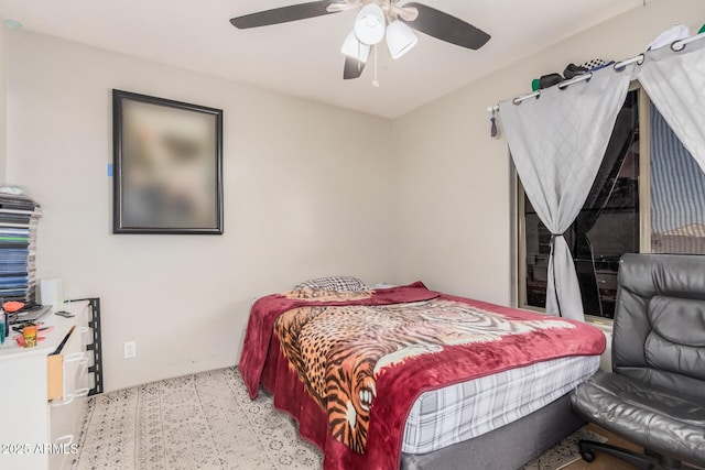 bedroom featuring ceiling fan