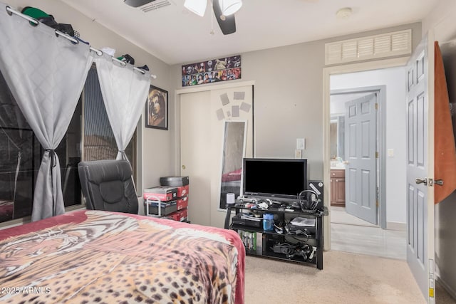 bedroom featuring ceiling fan and a closet