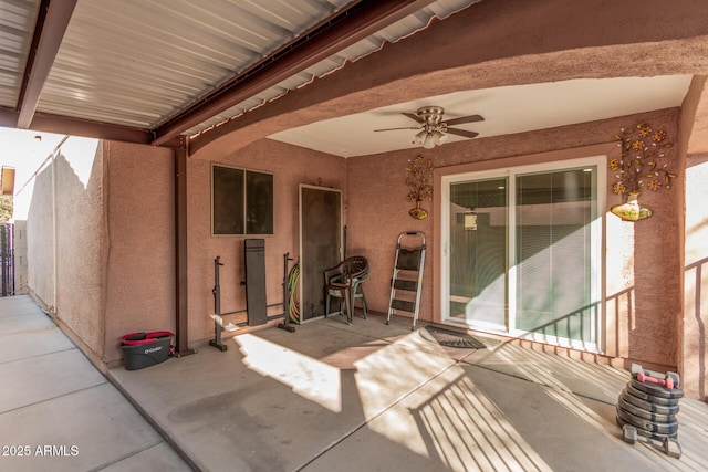 view of patio with ceiling fan