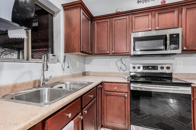 kitchen with sink and stainless steel appliances