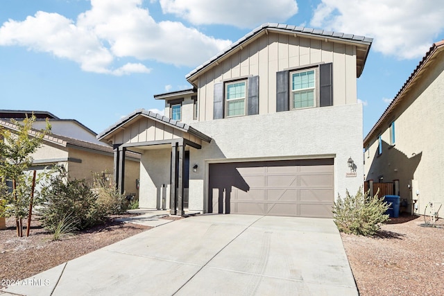 view of front of property with a garage