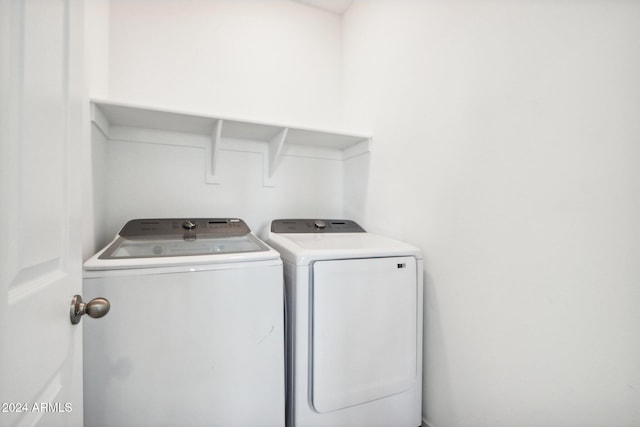 laundry area featuring washing machine and dryer