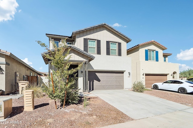 view of front of property with a garage