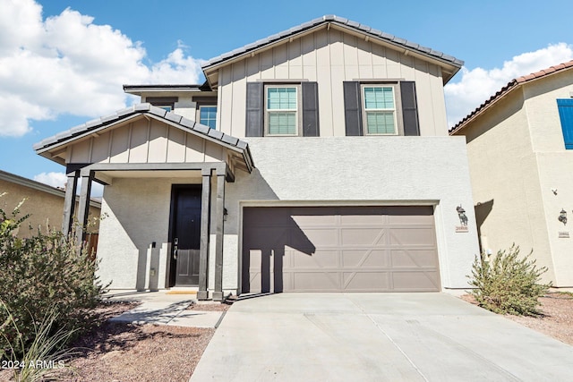 view of front of property with a garage