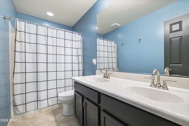 4512 W Stoneman Dr, Anthem, AZ 85086 - bathroom with toilet, tile patterned flooring, double vanity, and a shower with shower curtain