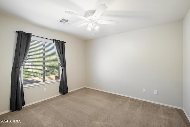 4512 W Stoneman Dr, Anthem, AZ 85086 - carpeted spare room with a ceiling fan and baseboards