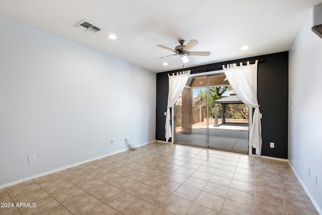 unfurnished room with ceiling fan