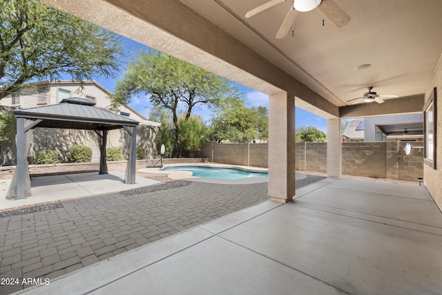 4512 W Stoneman Dr, Anthem, AZ 85086 - view of patio with ceiling fan, a fenced backyard, and a gazebo