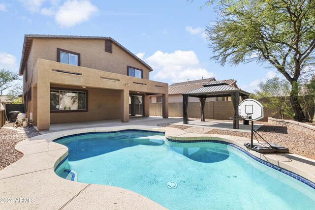 4512 W Stoneman Dr, Anthem, AZ 85086 - view of pool with a gazebo, a patio, and a fenced backyard