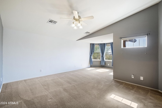 4512 W Stoneman Dr, Anthem, AZ 85086 - carpeted spare room featuring vaulted ceiling, a ceiling fan, and baseboards