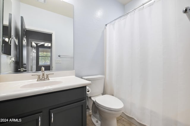 4512 W Stoneman Dr, Anthem, AZ 85086 - full bath featuring toilet, vanity, tile patterned flooring, and curtained shower