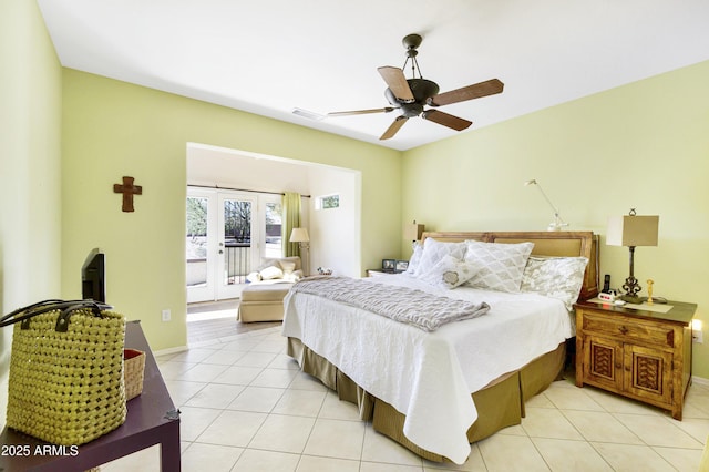 bedroom with access to exterior, french doors, light tile patterned floors, visible vents, and ceiling fan