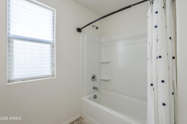 bathroom with shower / tub combo