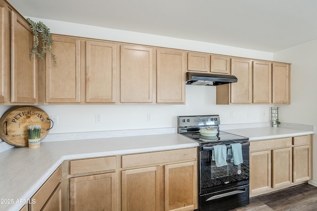 kitchen featuring light brown cabinetry, black electric range oven, and dark hardwood / wood-style floors