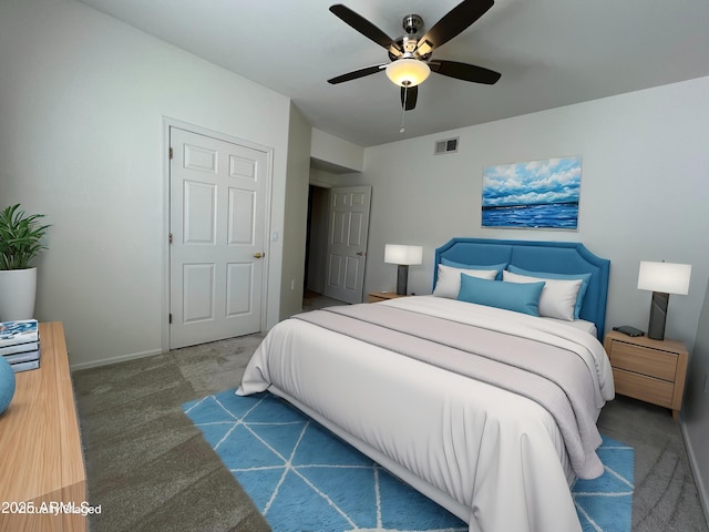 carpeted bedroom featuring ceiling fan, visible vents, and baseboards