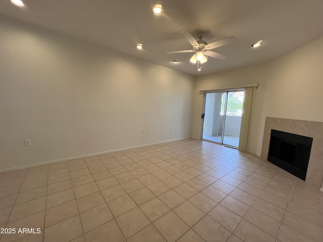 unfurnished living room featuring a ceiling fan, recessed lighting, a fireplace, and baseboards