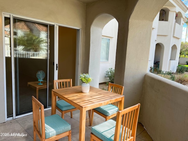 balcony featuring outdoor dining space