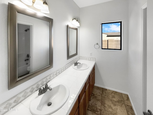 full bathroom with vanity, toilet, tile patterned floors, and shower / bathing tub combination