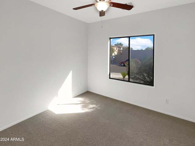 carpeted empty room with ceiling fan