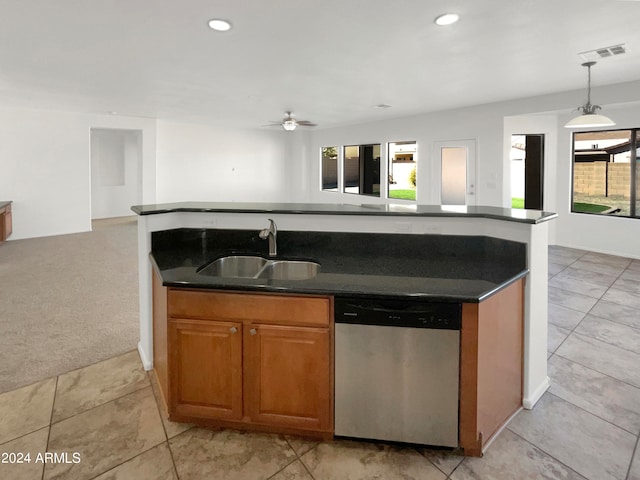 kitchen with dishwasher, sink, light colored carpet, pendant lighting, and ceiling fan