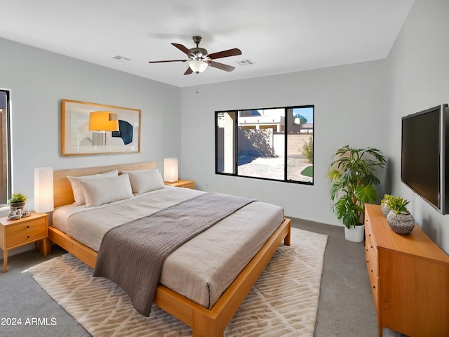 carpeted bedroom featuring ceiling fan