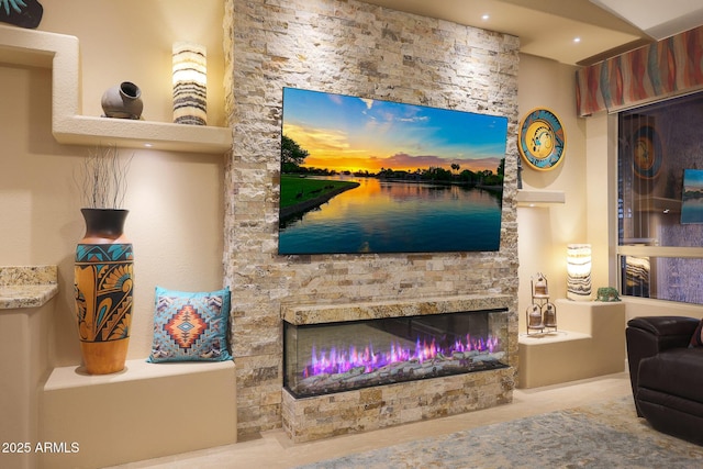 living room featuring a fireplace