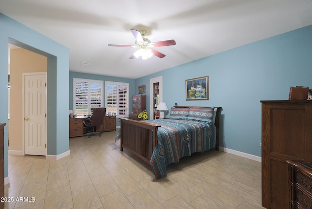 bedroom featuring ceiling fan