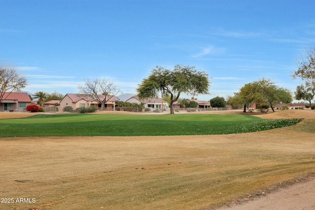 view of home's community featuring a yard