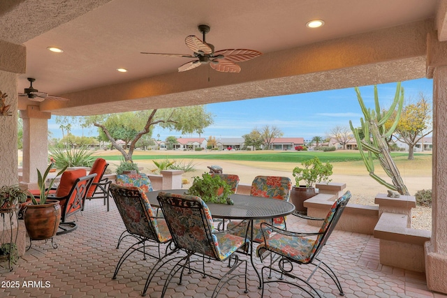 view of patio / terrace featuring ceiling fan