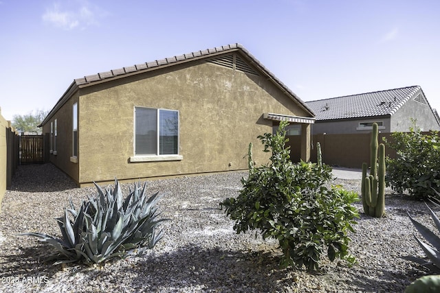 back of house featuring a patio area