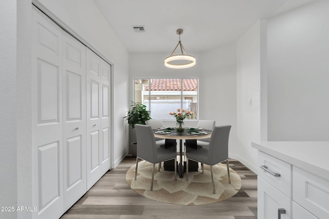 dining room featuring light wood-type flooring