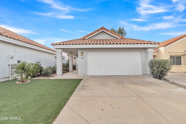 view of front facade with a garage and a front lawn