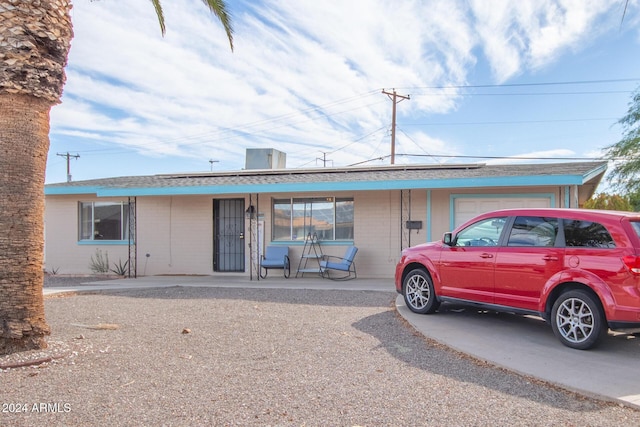 single story home with a garage