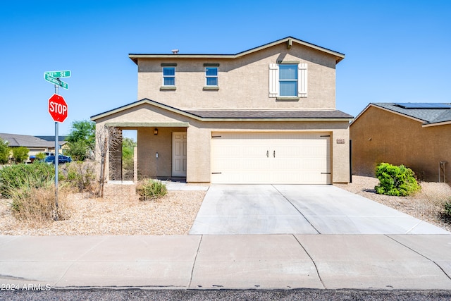 front of property featuring a garage