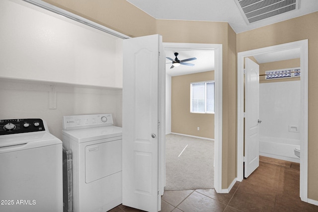 5252 W Pontiac Dr, Glendale, AZ 85308 - laundry room featuring laundry area, ceiling fan, dark tile patterned flooring, visible vents, and washer and clothes dryer