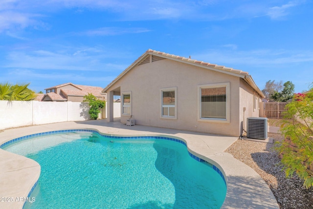 5252 W Pontiac Dr, Glendale, AZ 85308 - view of swimming pool featuring central AC, a fenced backyard, a fenced in pool, and a patio